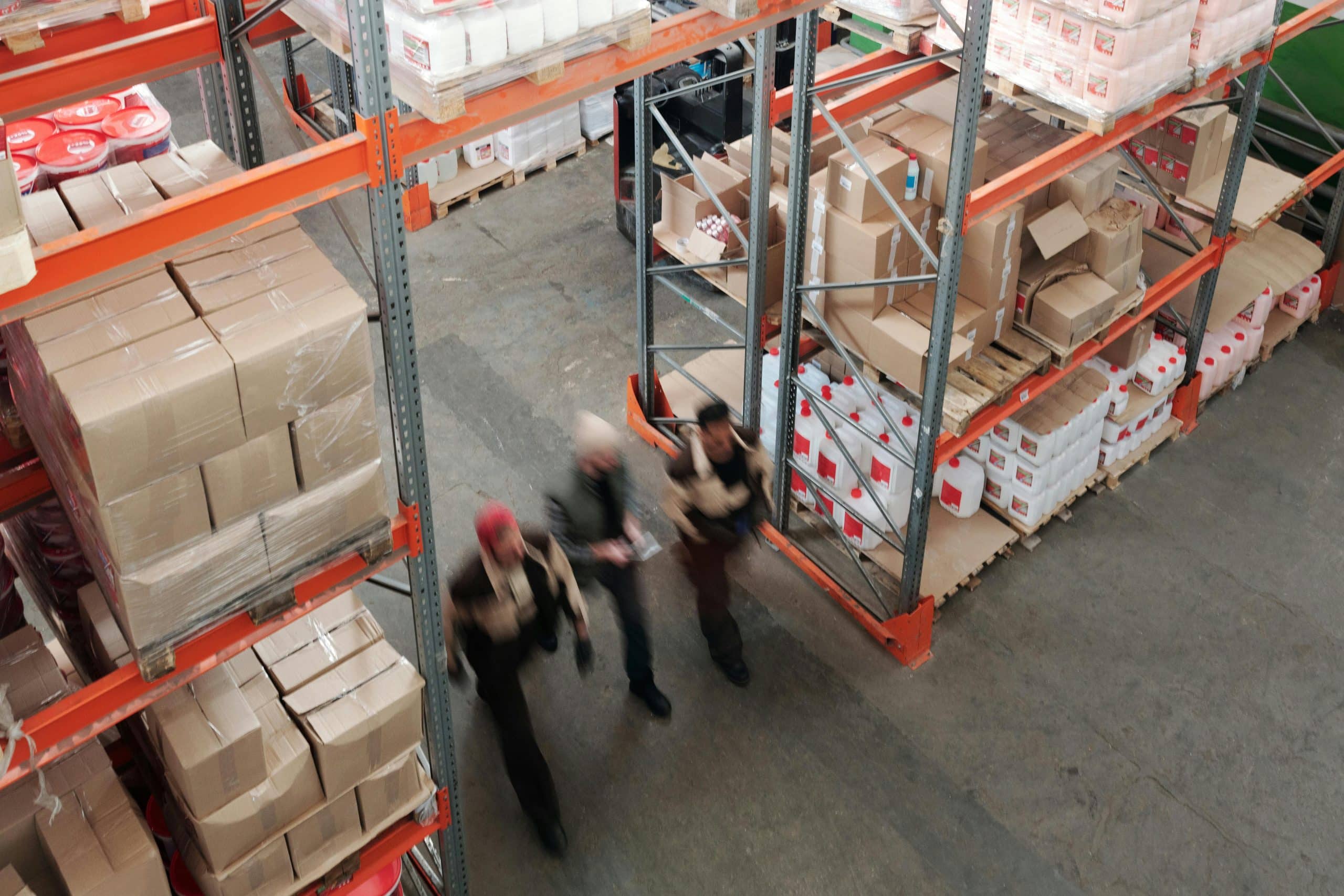 workers walking in a warehouse